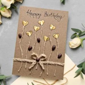 Handmade Personalised Card for Her or His Birthday card adorned with gold hearts and beans, perfect for celebrating her or his birthday.