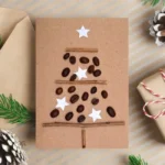Handmade Personalised Christmas Tree Card made of coffee beans and wooden sticks.