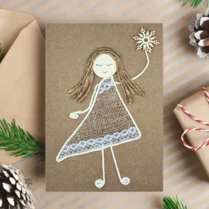 Unique and Beautiful Christmas Card for Mum from Daughter with a beautiful girl holding snowflake made of lace and cotton string.