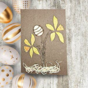 Easter card showcasing beautifully crafted gold and white eggs, representing the handmade Easter card collection.